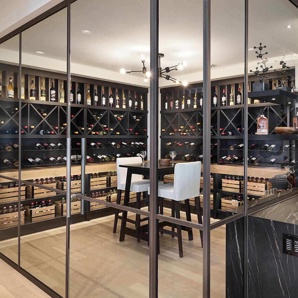 VintageView Presentation Row wall-mounted wine rack in a modern glass-enclosed wine cellar