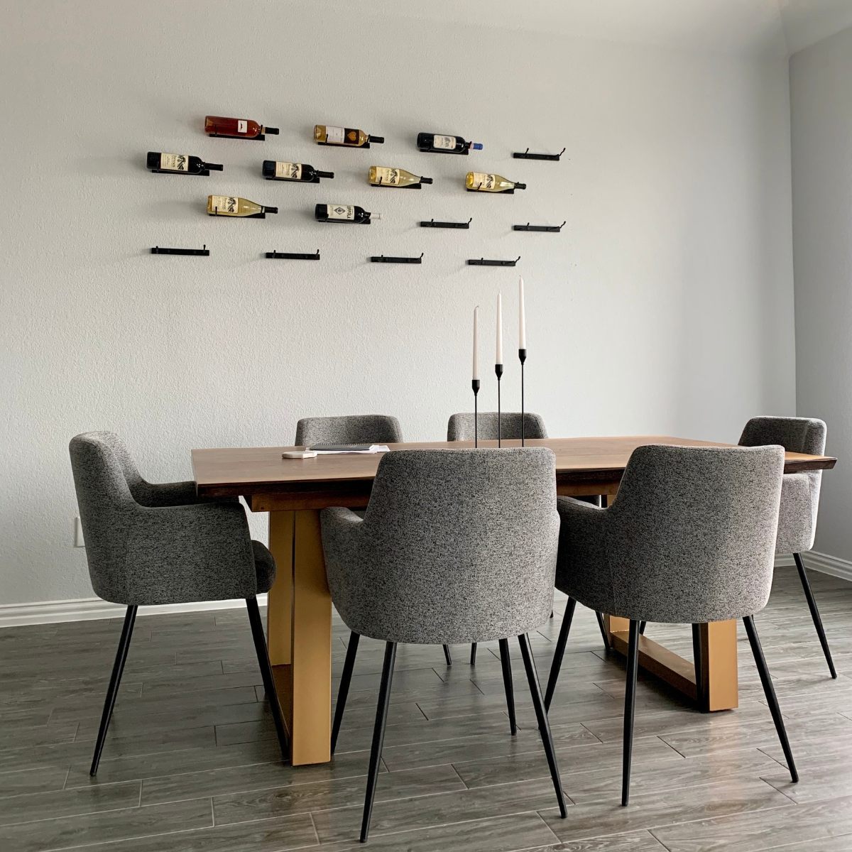 VintageView wall mounted metal wine rack installed in modern dining room