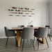 VintageView wall mounted metal wine rack installed in modern dining room
