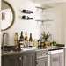 VintageView wall mounted metal wine rack installed above home bar counter