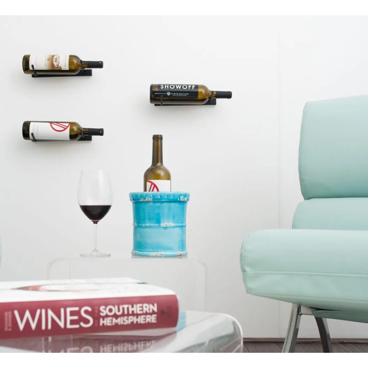 VintageView wall mounted metal wine rack displaying single wine bottle