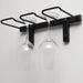 Close up of matte black wall mounted wine glass stemware rack holding upside down wine glasses