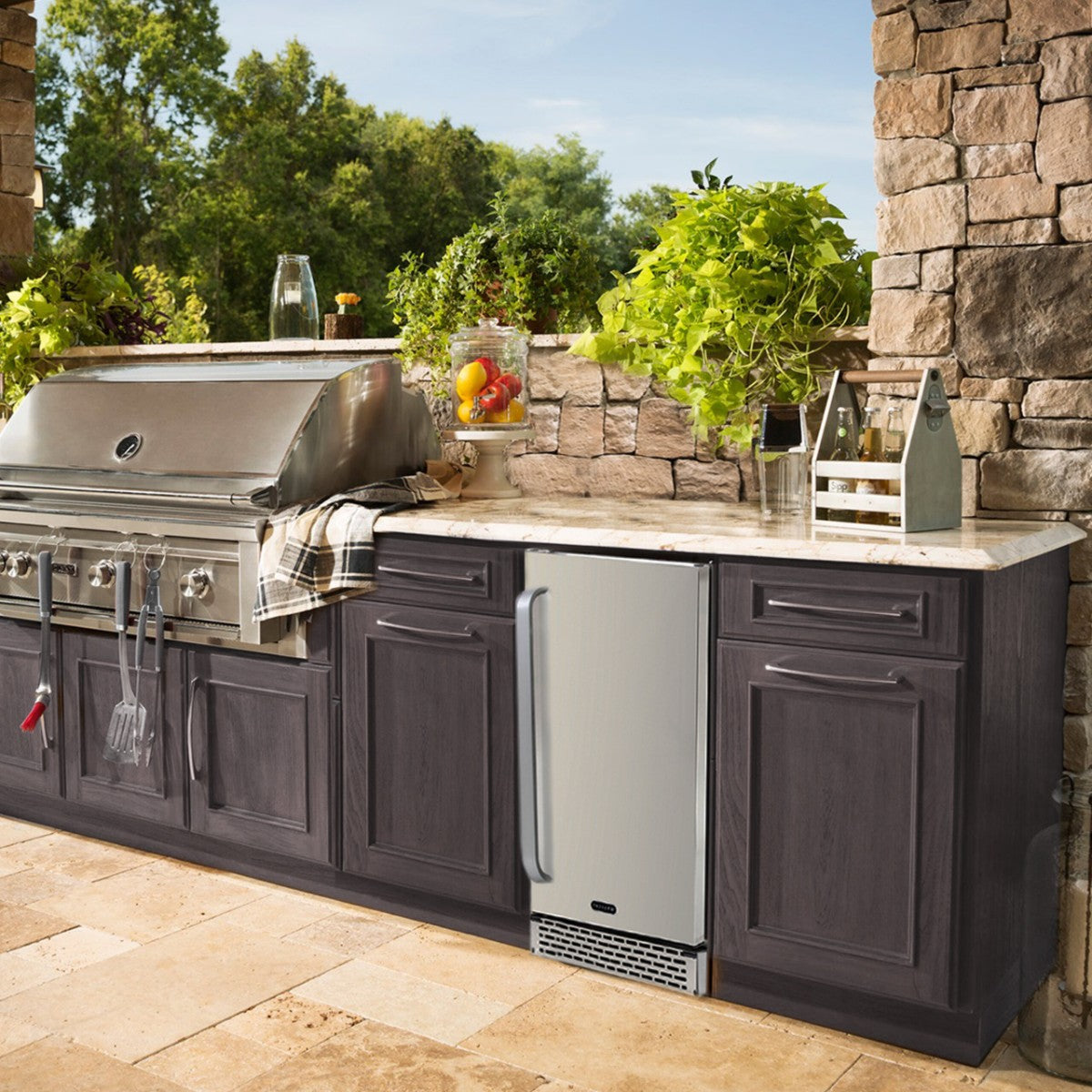 Whynter BOR-326FS Indoor/Outdoor 15" Beverage Refrigerator - Outdoor kitchen featuring a built-in stainless steel fridge beside a grill station